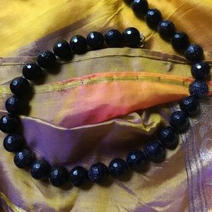 Midnight goldstone single strand necklace